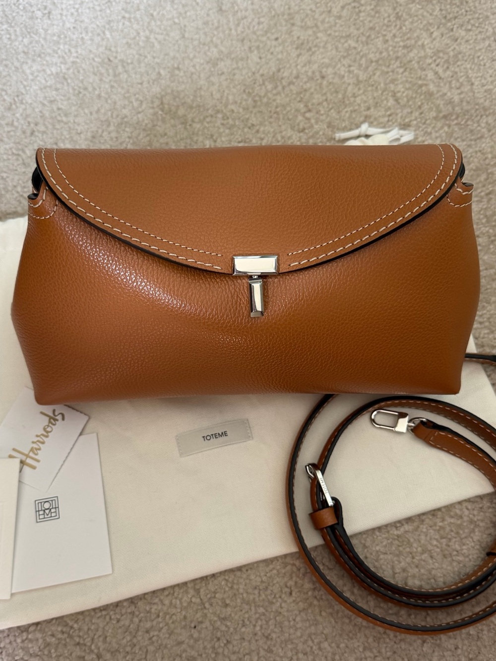 Toteme T-Lock Leather Clutch